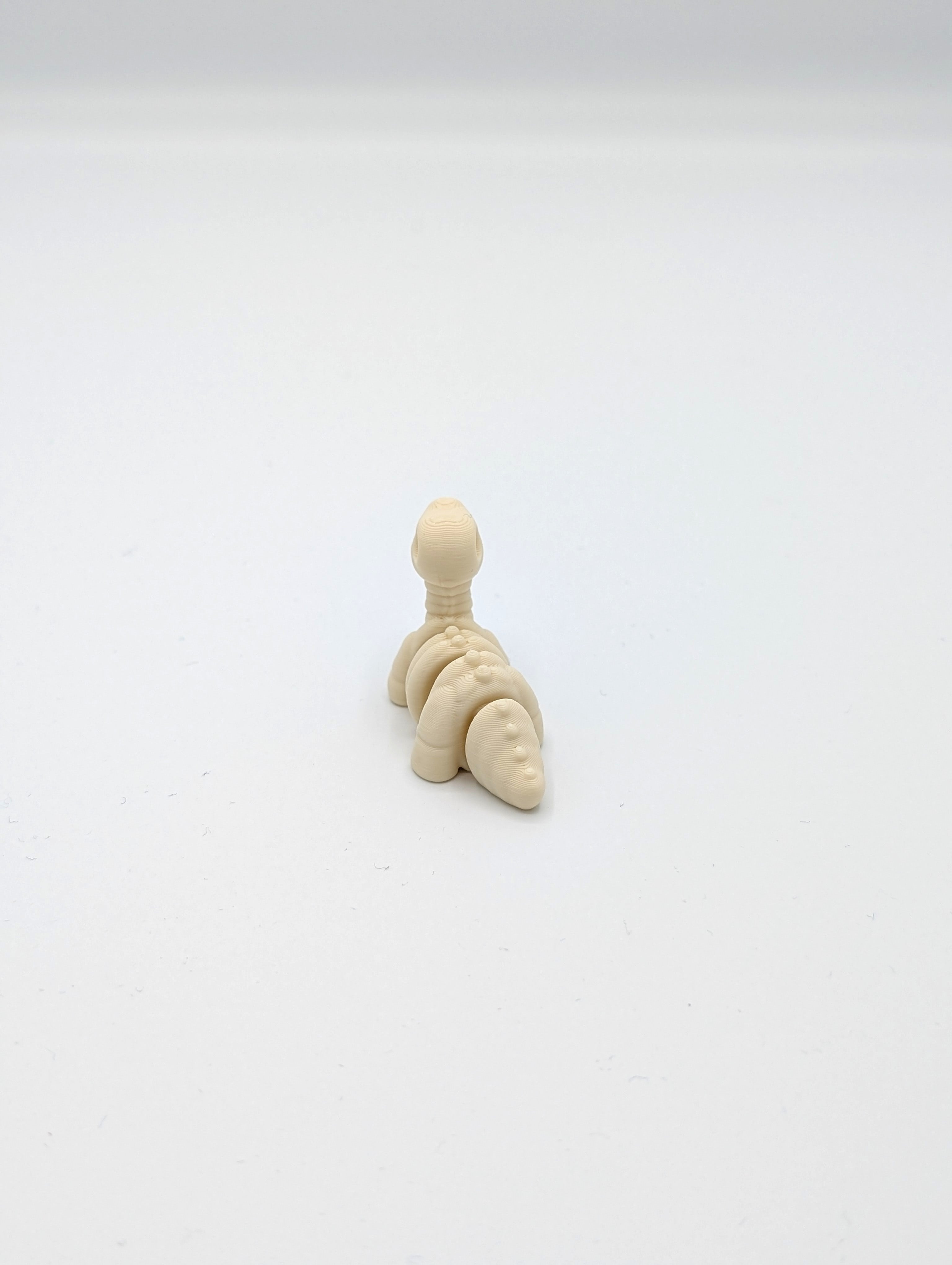 Brontosauro scheletro fossile mini fidget